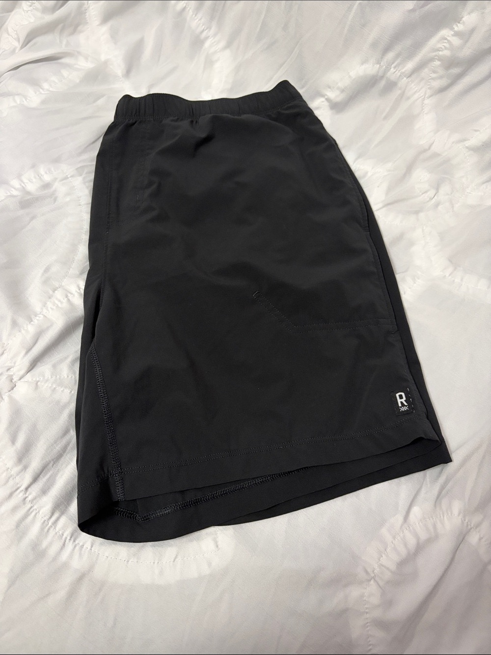 RHONE Black Athletic Shorts with Subtle Logo